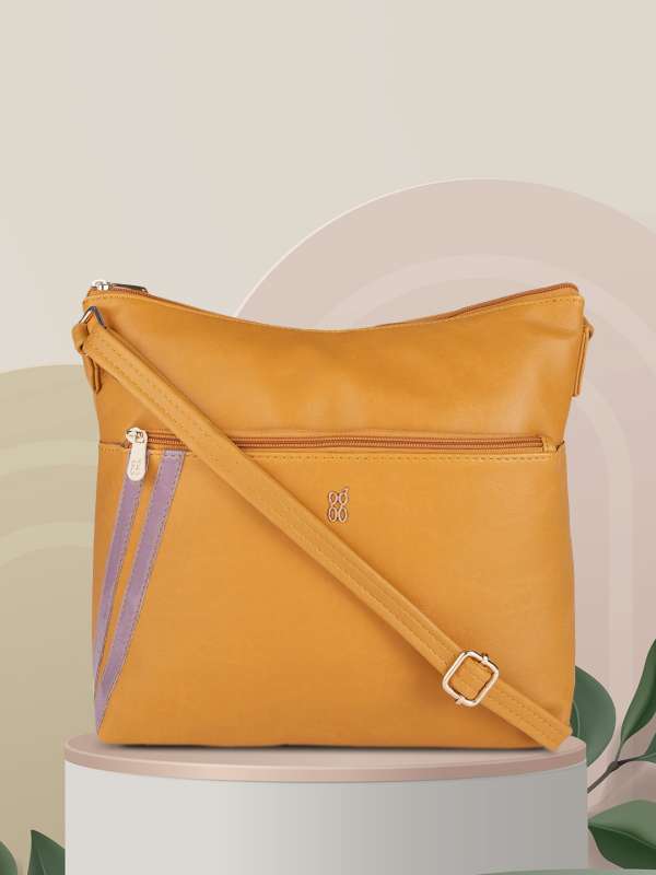 Baggit mustard yellow solid sling bag new arrivals