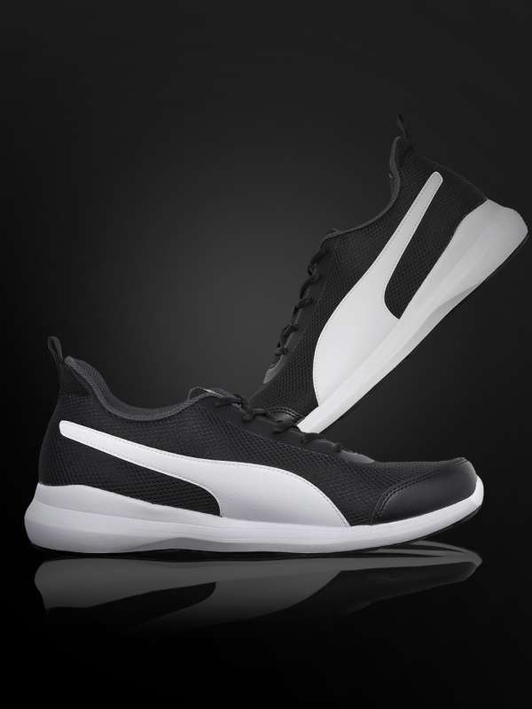 all black puma tennis shoes