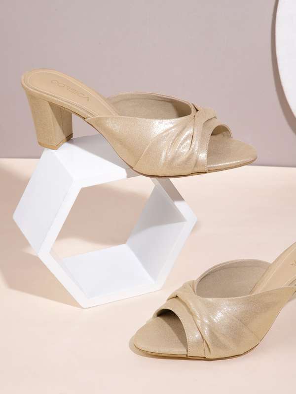 Golden sale heels myntra