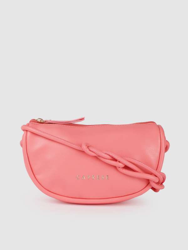 Caprese pink solid sling bag shop