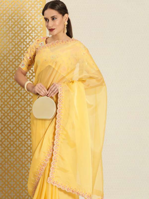 Myntra yellow saree store