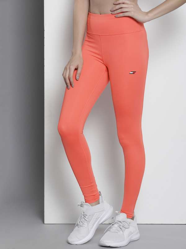 Buy Orange Leggings for Women by NIKE Online