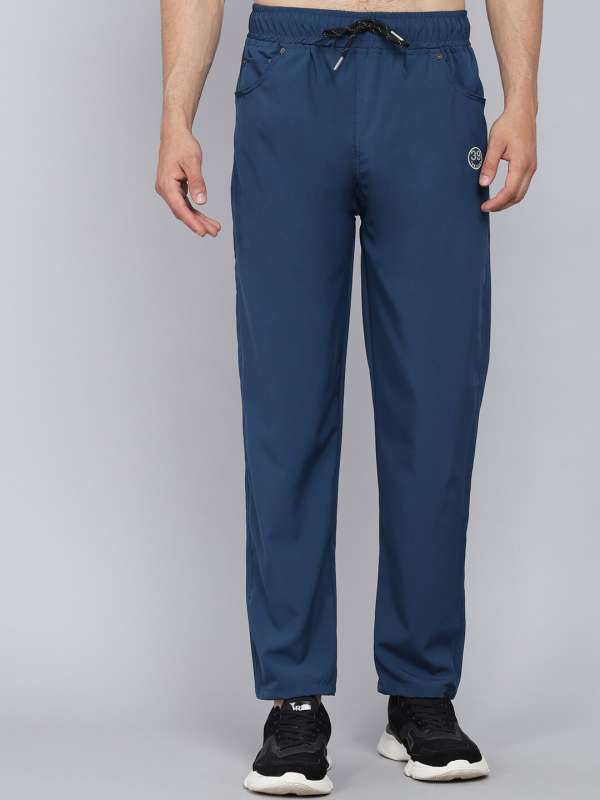 DOMYOS by Decathlon Solid Women Blue Track Pants  Buy Domyos Blue DOMYOS  by Decathlon Solid Women Blue Track Pants Online at Best Prices in India   Flipkartcom