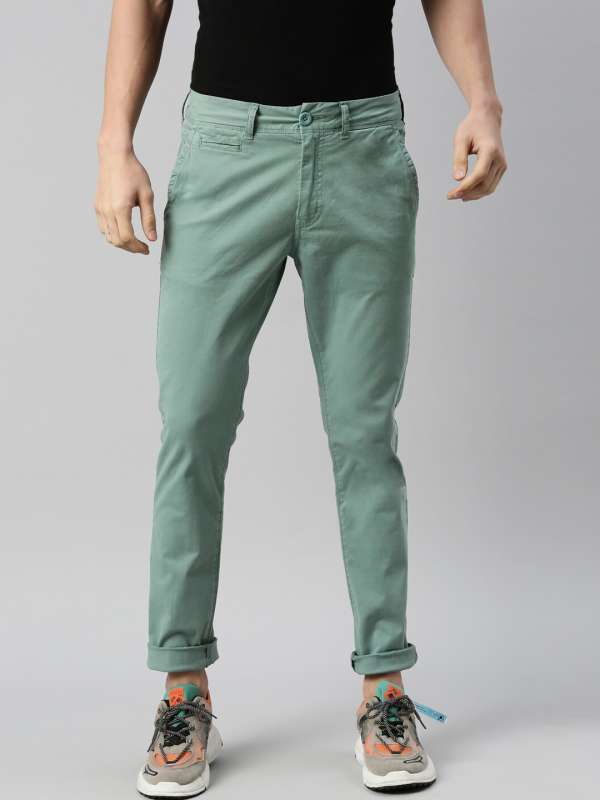 Buy Orange Trousers & Pants for Men by BREAKBOUNCE Online