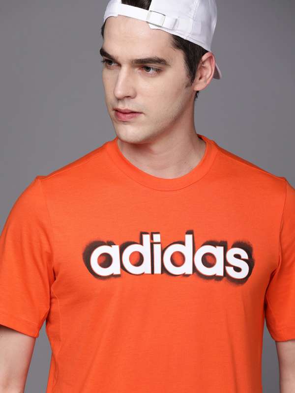 Orange adidas store t shirt