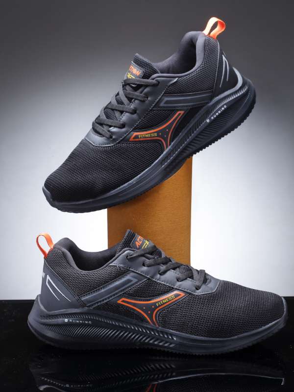 Action black top running shoes