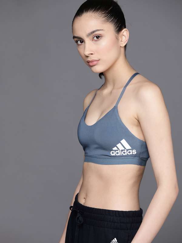 Buy online Beige Solid Sports Bra from lingerie for Women by Madam for ₹369  at 65% off
