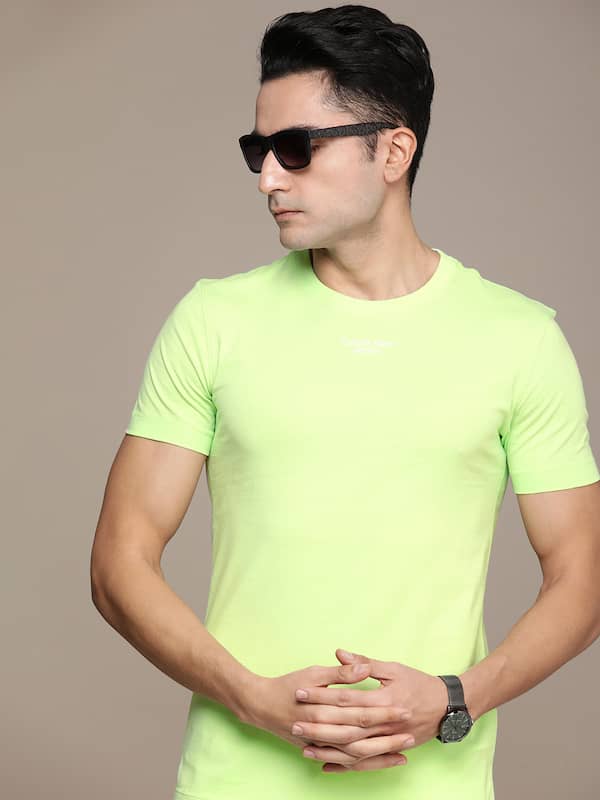 Calvin Klein Jeans Green Solid Round Neck Tshirt - Buy Calvin Klein Jeans  Green Solid Round Neck Tshirt online in India
