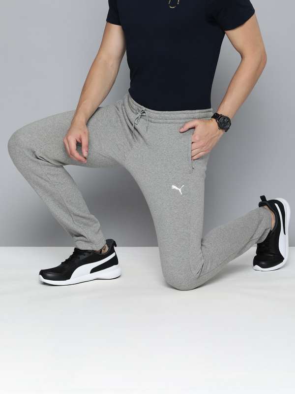 PUMA Pants Solid Men Black Track Pants - Buy PUMA Pants Solid Men Black  Track Pants Online at Best Prices in India