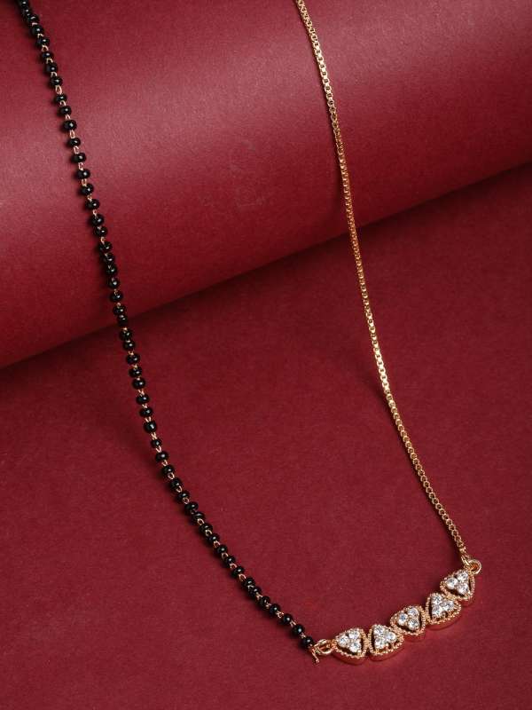 Short black beads gold chain models in khazana store