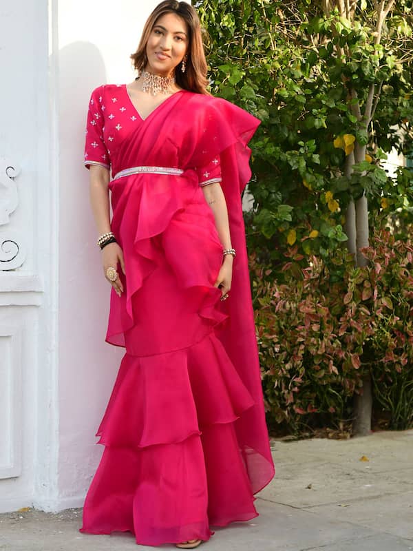 Ruffled Skirt Saree with a Side Drape And a Pearl Dropped Blouse – Anushkaa  Bajaj