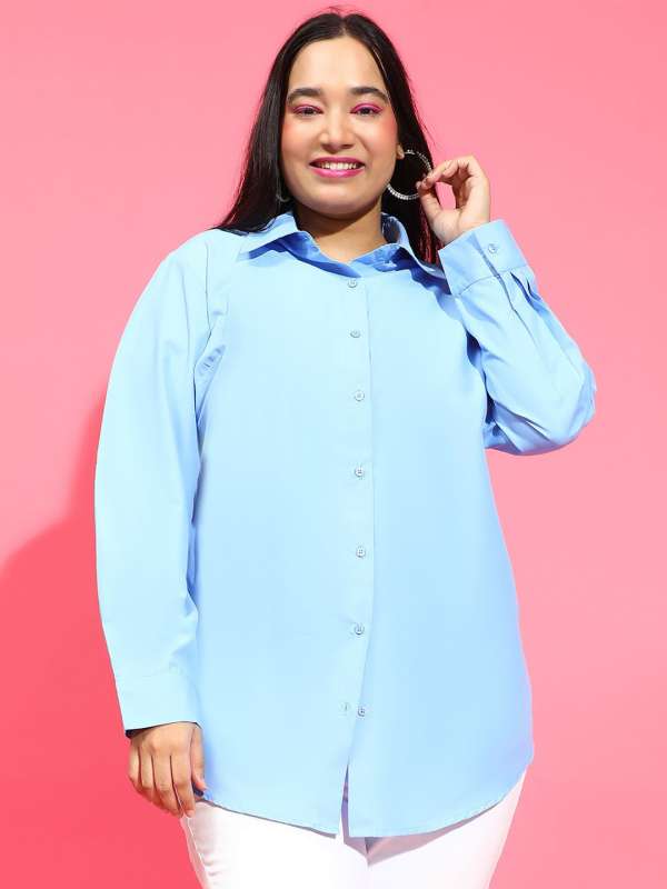 Sweaters on formal shirts shop