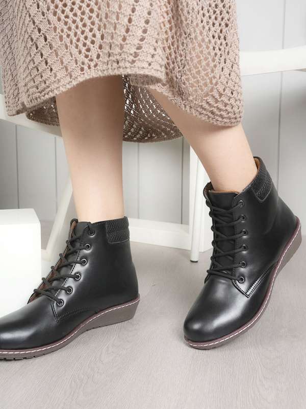 Shop the Latest Collection of Women s Boots Online at Myntra