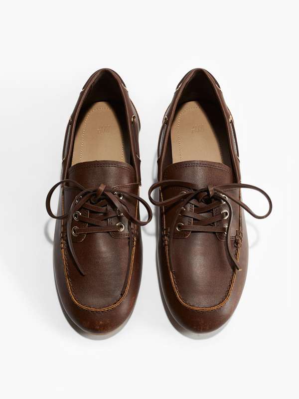 Price of duckback rain shoes online