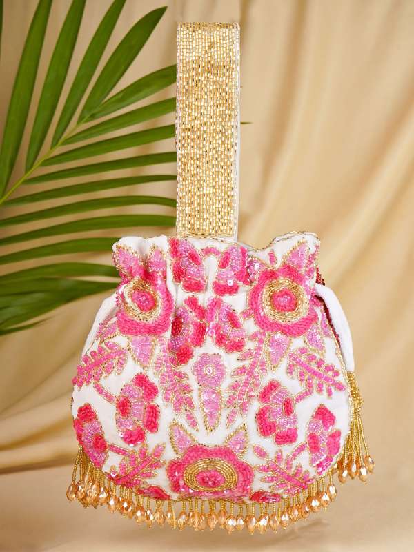 Hand held clutch bag top