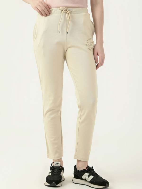 Cream track pants sale