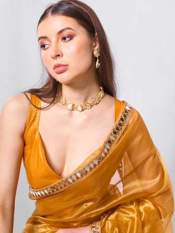Myntra golden saree clearance