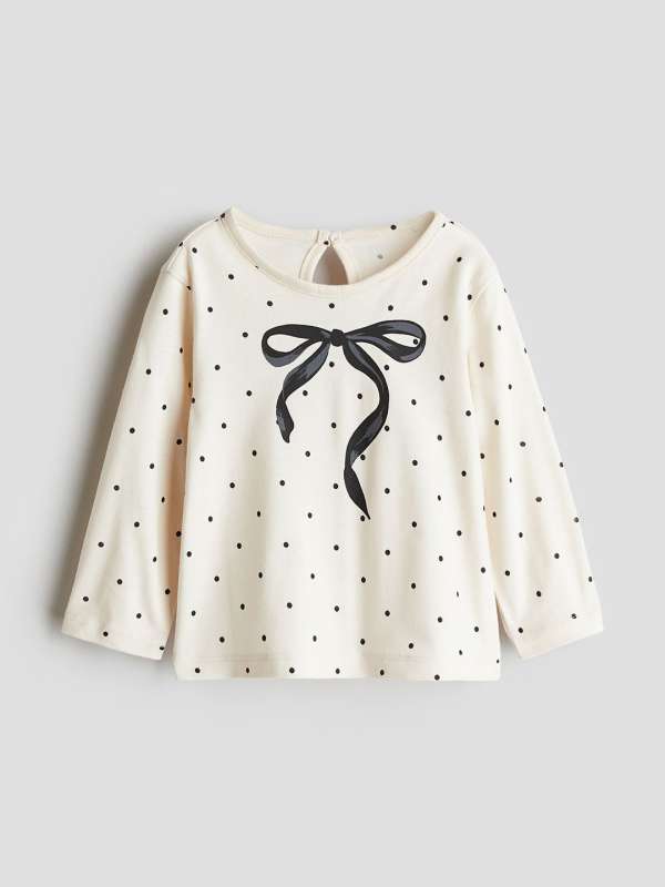 Designer tops new arrivals