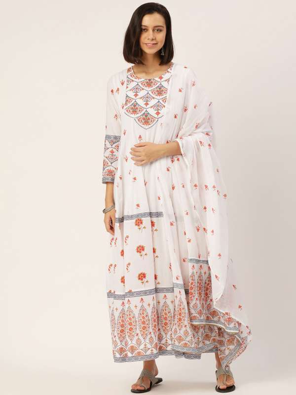 White churidar top with red dupatta