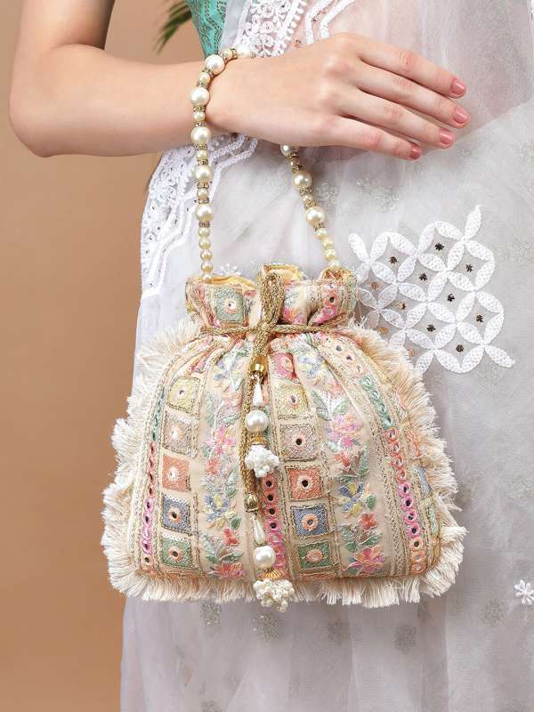 Buy Gold Beige Potli Bag In Brocade Silk With Pink Geometric Jaal Design  Online  Kalki Fashion