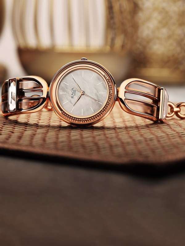 Rose gold watches titan raga discount