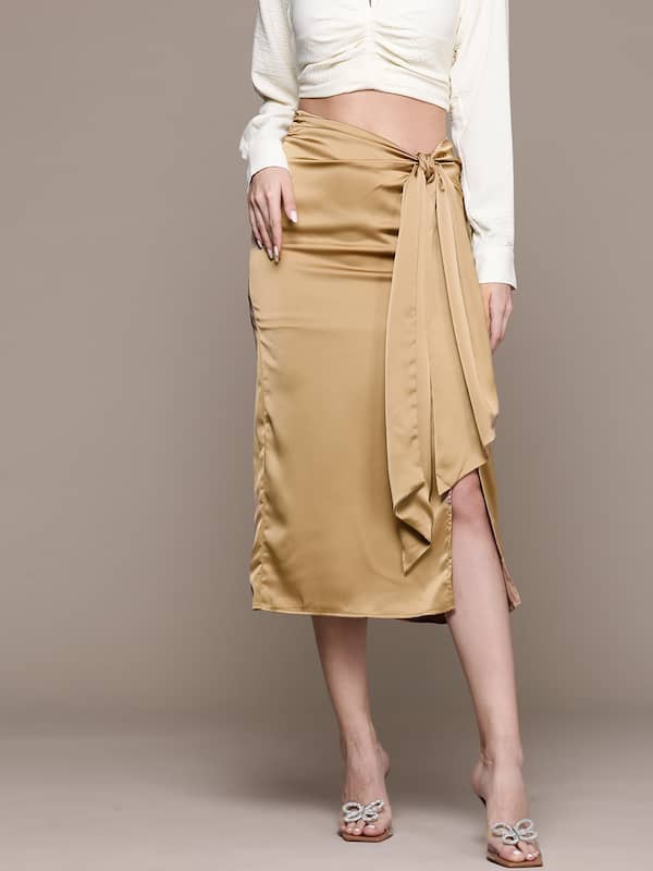 Cold shoulder peach crop top with layered satin skirt only on Kalki