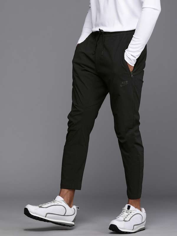 Nike Tapered Logoprint Nylon Track Pants in Black for Men  Lyst UK
