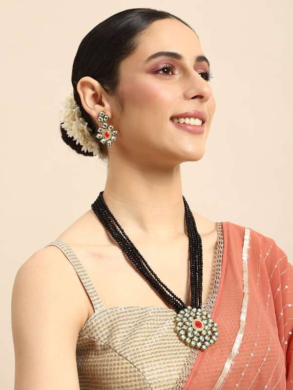 Tanishq kundan pendant set store