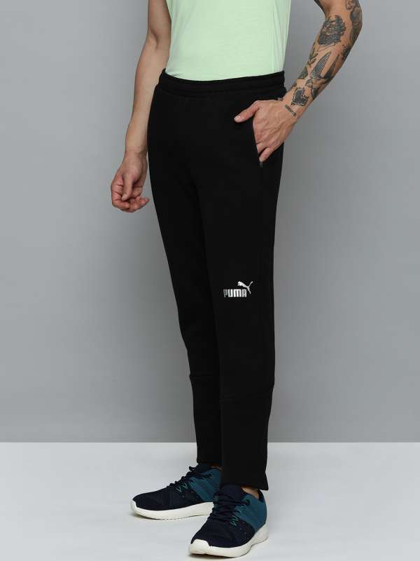 PUMA Classics Relaxed Jogger Solid Women Black Track Pants - Buy