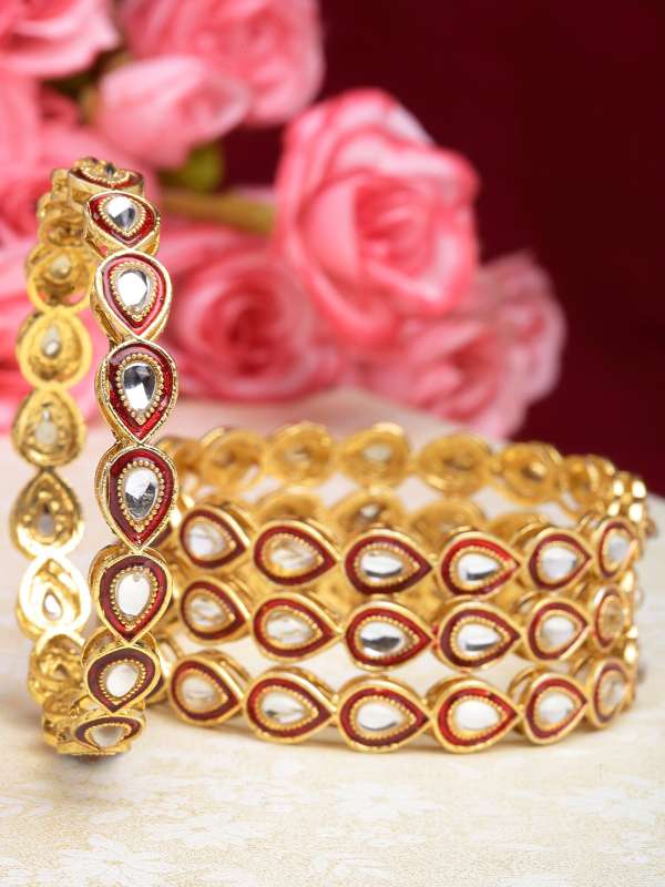 Red bangles sales with gold design