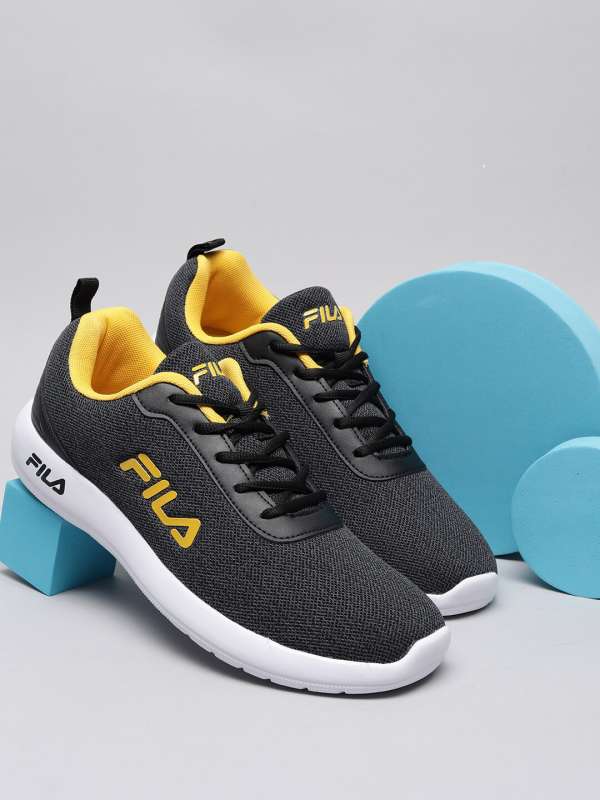 Fila black and yellow shoes on sale