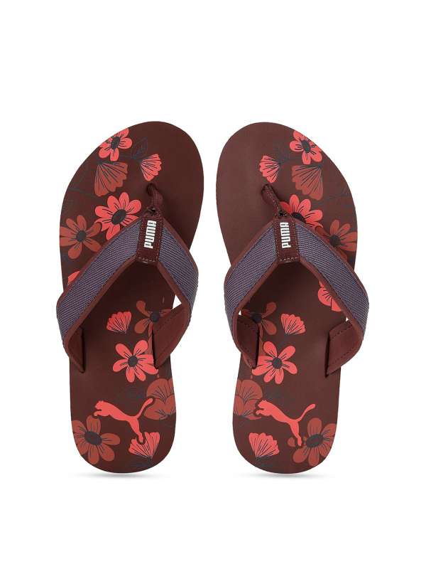 Puma brown flip flops on sale