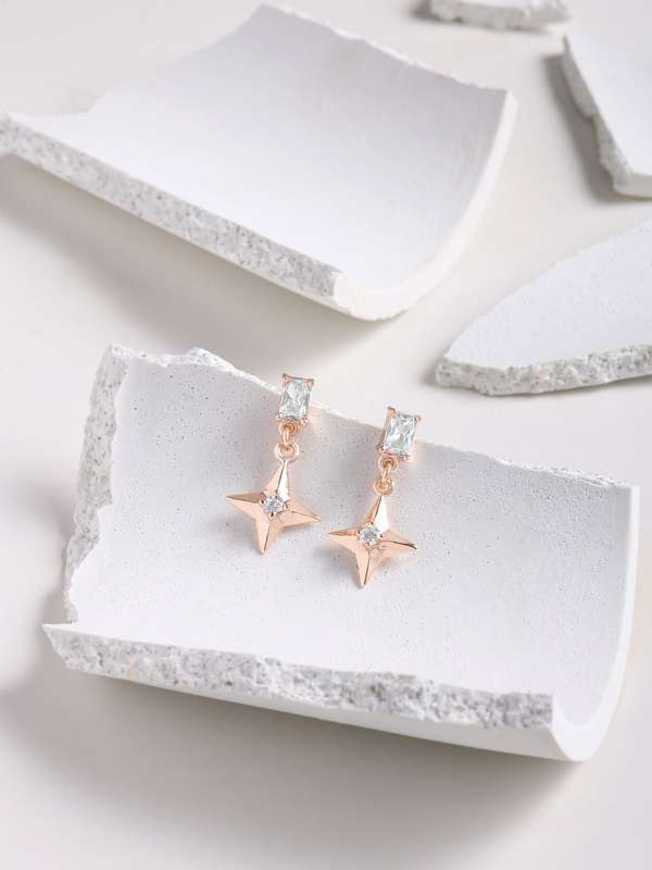 Nike ear studs top