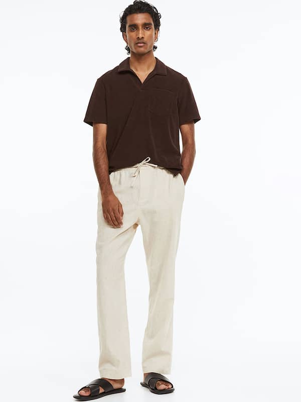 Darted 100 linen trousers with turnup hem  Massimo Dutti