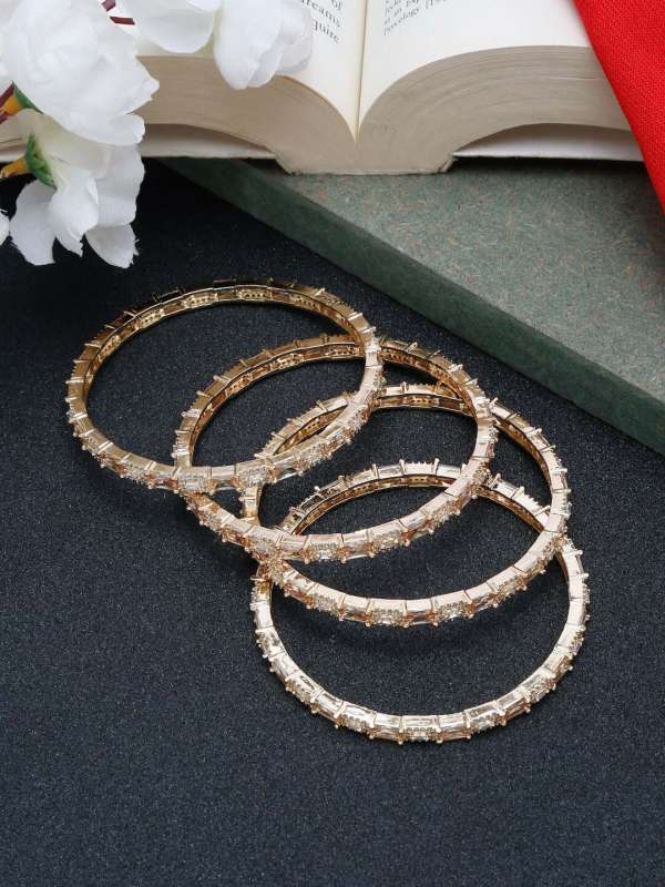 Sukkhi Set Of 4 Goldenwhite Alloy Bangle 2806121.htm Buy Sukkhi