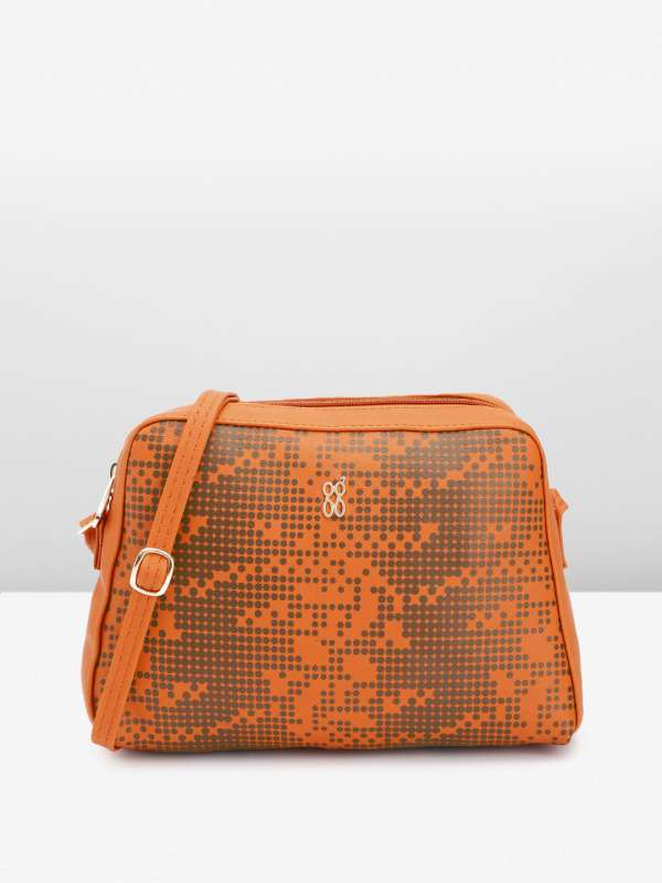 Baggit orange sling bag outlet
