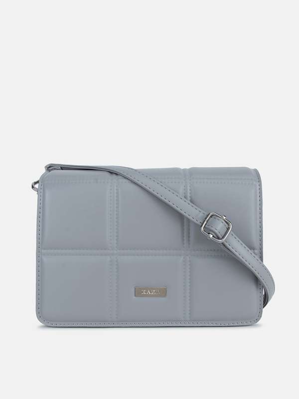Buy Brown Textured Handheld Bag online | Looksgud.in