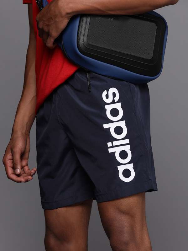 Shorts 7 pulgadas on sale essentials 3 tiras chelsea