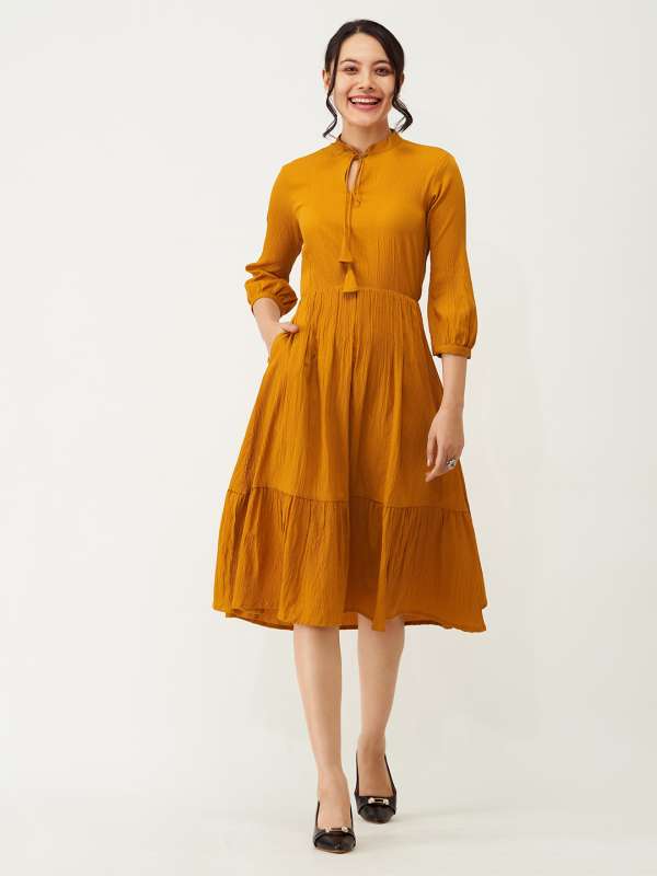 Mustard dresses online on sale