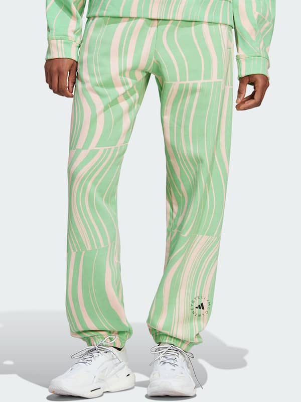adidas Originals 'adicolor 70s' velour track pants in green | ASOS
