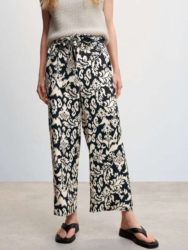 Buy Women Black  White Printed Parallel Trousers online  Looksgudin