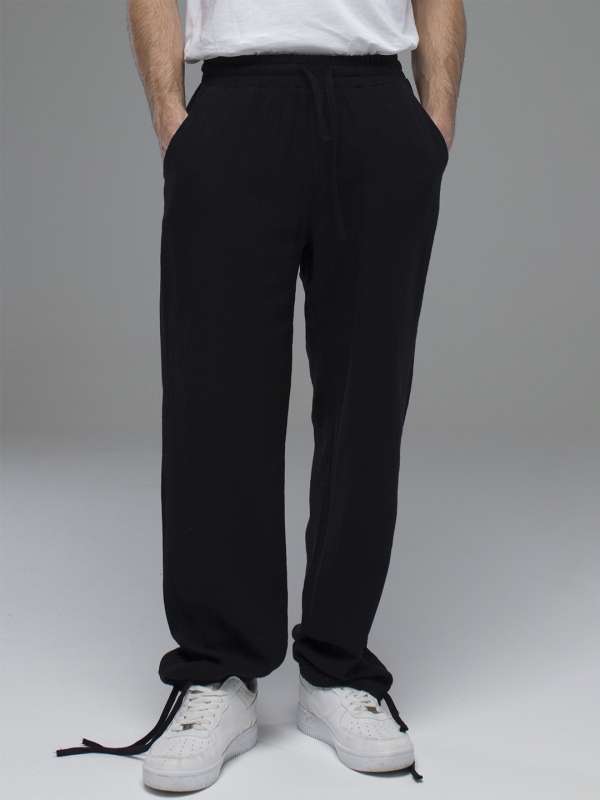 Buy Men Black Relaxed Fit Trackpants for Men Online at Bewakoof