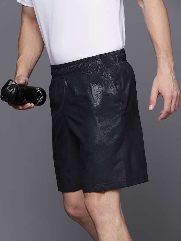 Men's UA Elevated Woven Graphic Shorts, Under Armour in 2024