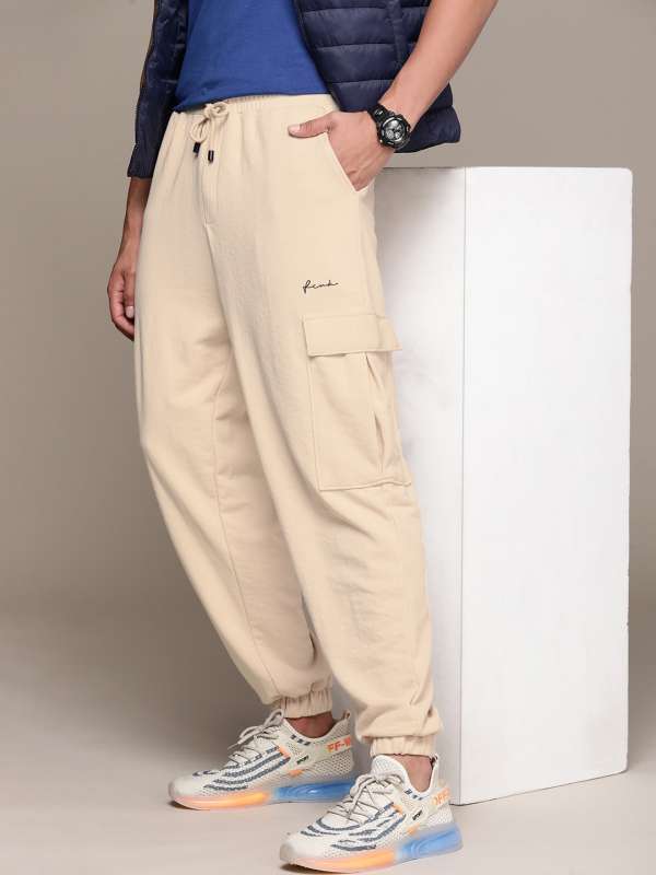 Cream track pants online