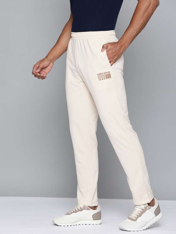 Cream track pants store