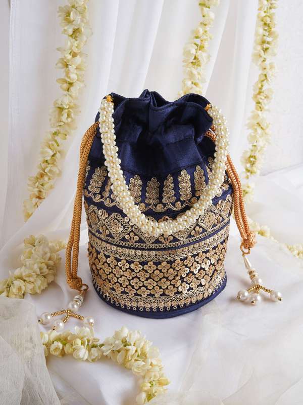 Shop Rubans Cream Coloured Velvet Potli Bag With Pearls And Golden Beads Online at Rubans