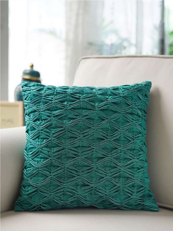 Teal and copper cushions on sale