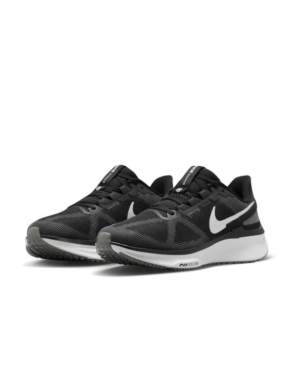 Nike black and 2025 white running shoes