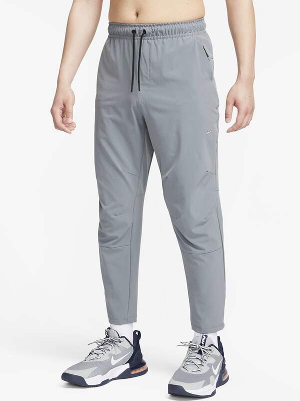Buy Nike Self Design Men White Track Pants Online at desertcartUAE