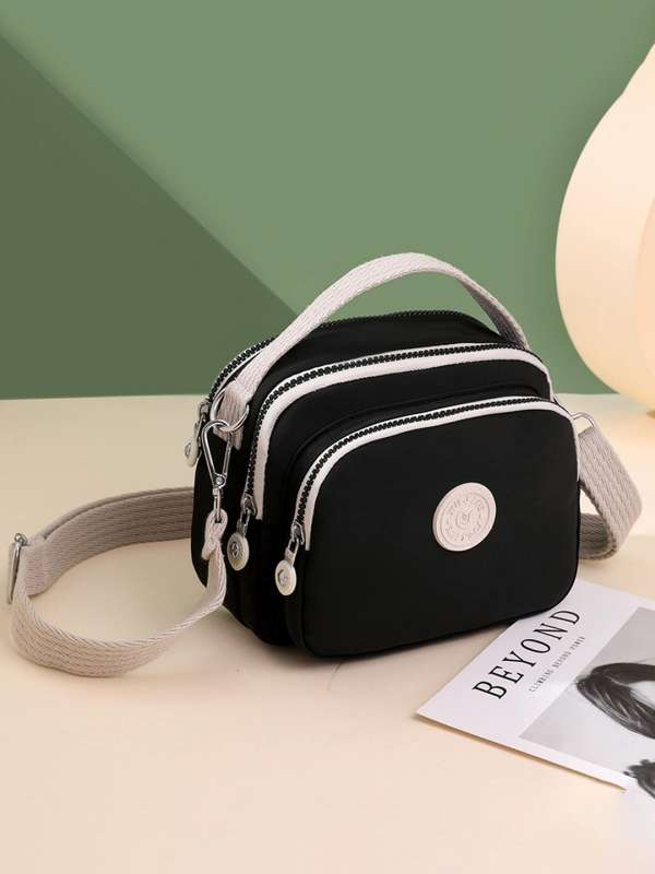 Coach sling top bags india